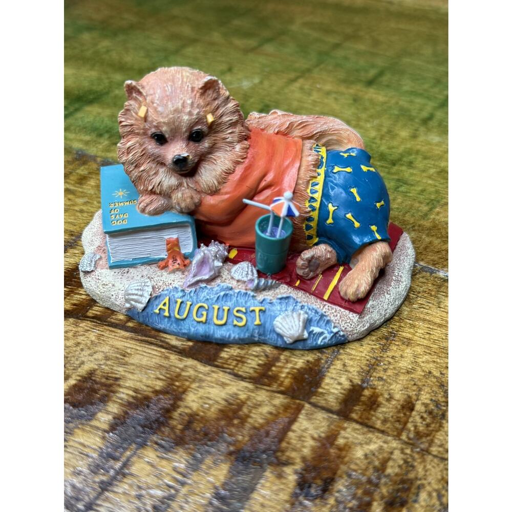 Danbury Mint Pomeranian Relaxing Beach August Month Perpetual Calendar Figure